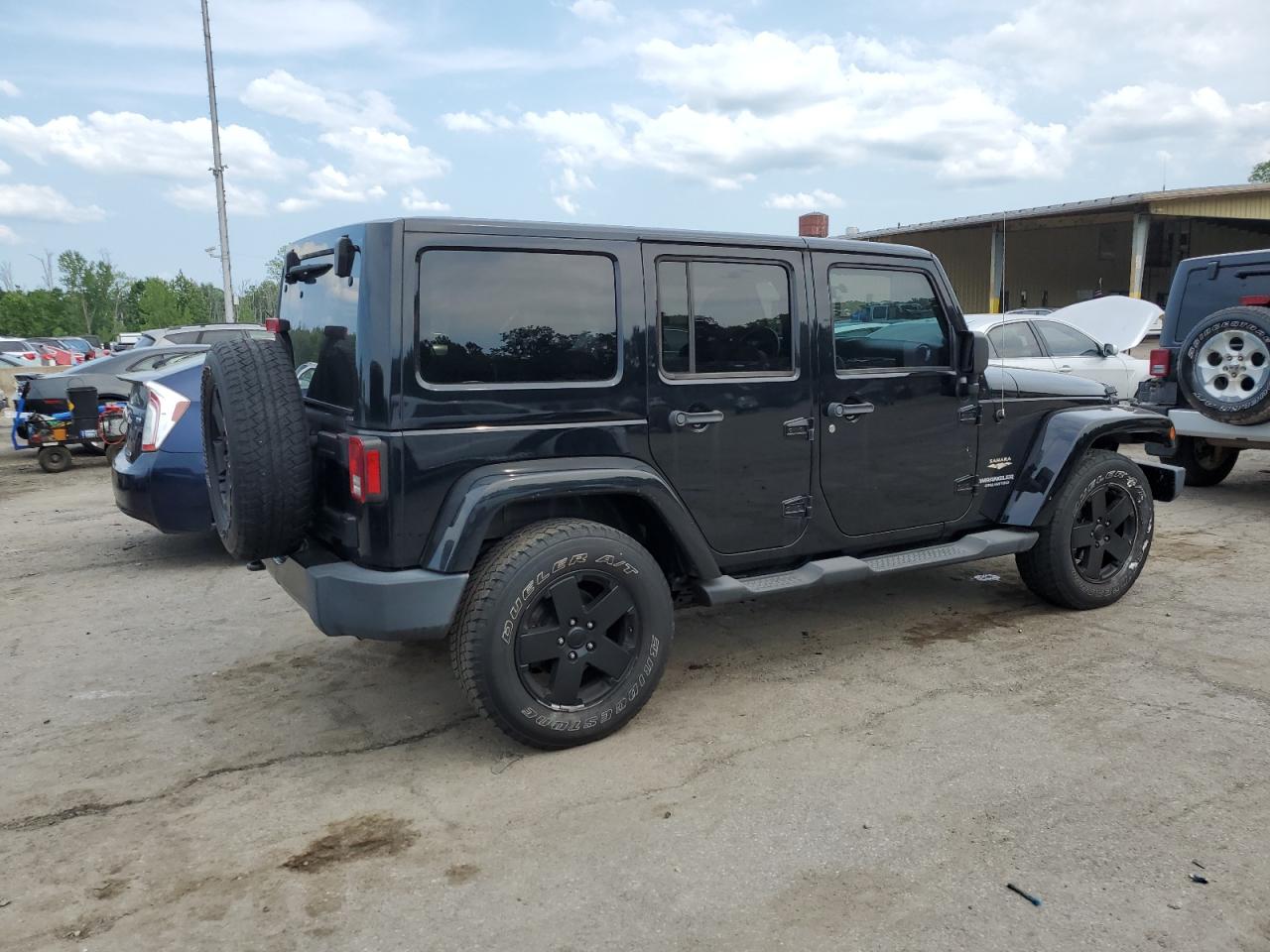 2011 Jeep Wrangler Unlimited Sahara VIN: 1J4BA5H15BL561970 Lot: 65849914