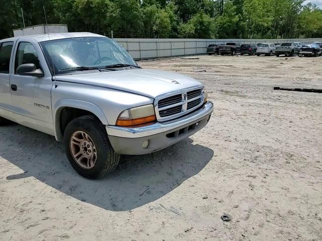 2002 Dodge Dakota Quad Slt VIN: 1B7HL48N12S719119 Lot: 65191434