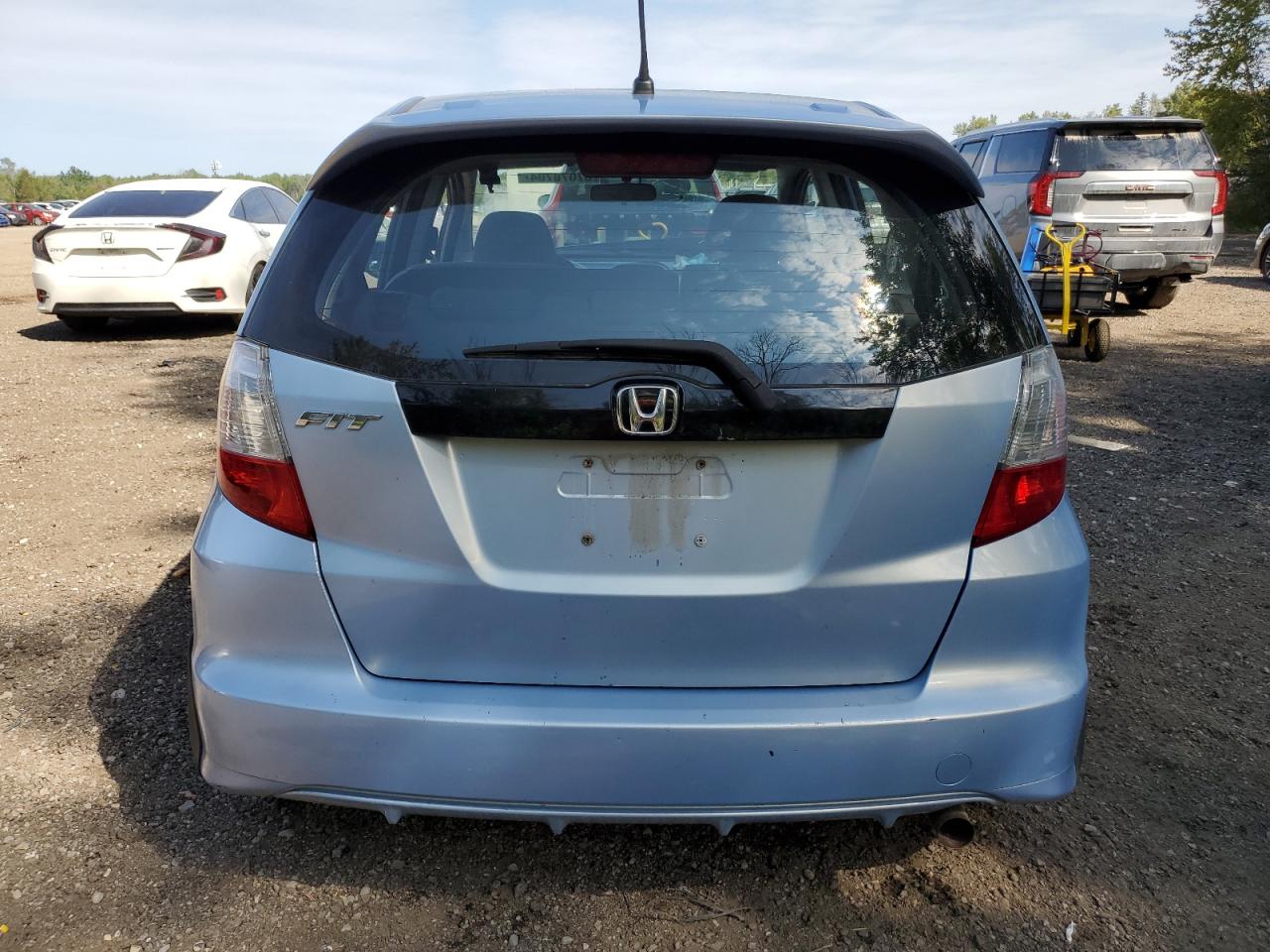 2010 Honda Fit Lx VIN: JHMGE8H57AC805524 Lot: 67078704