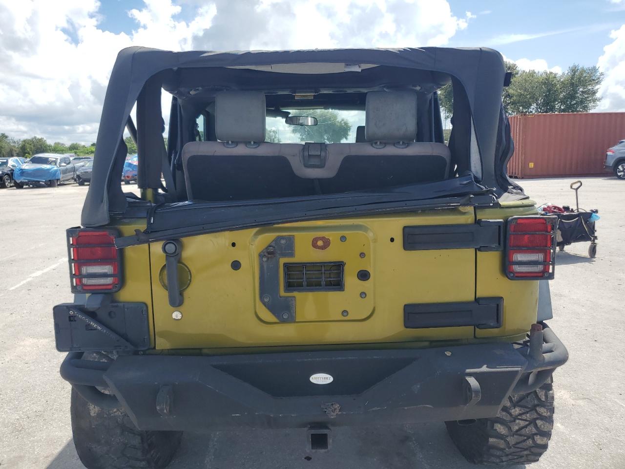 2010 Jeep Wrangler Sport VIN: 1J4AA2D17AL202196 Lot: 69225384