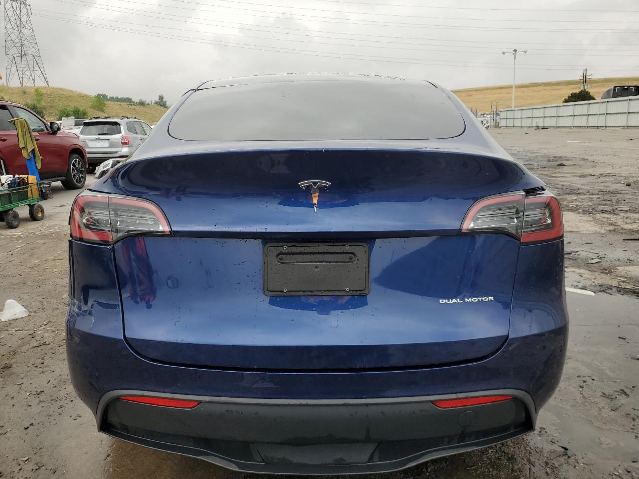 2023 Tesla Model Y VIN: 7SAYGDEEXPF948883 Lot: 66614654