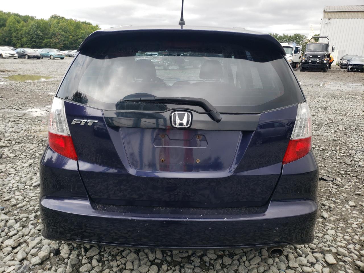 2009 Honda Fit Sport VIN: JHMGE88479S011194 Lot: 69815624