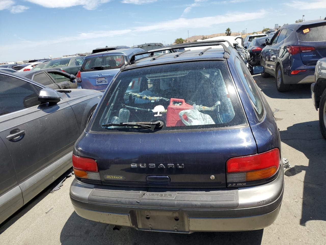 1996 Subaru Impreza Outback VIN: JF1GF4851TG811571 Lot: 65650514