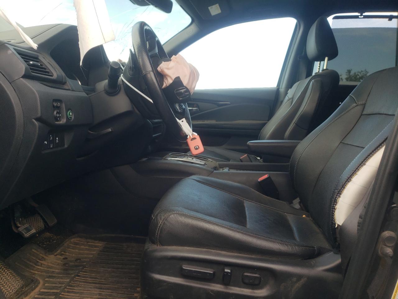 2020 Honda Passport Elite VIN: 5FNYF8H09LB013937 Lot: 65032544