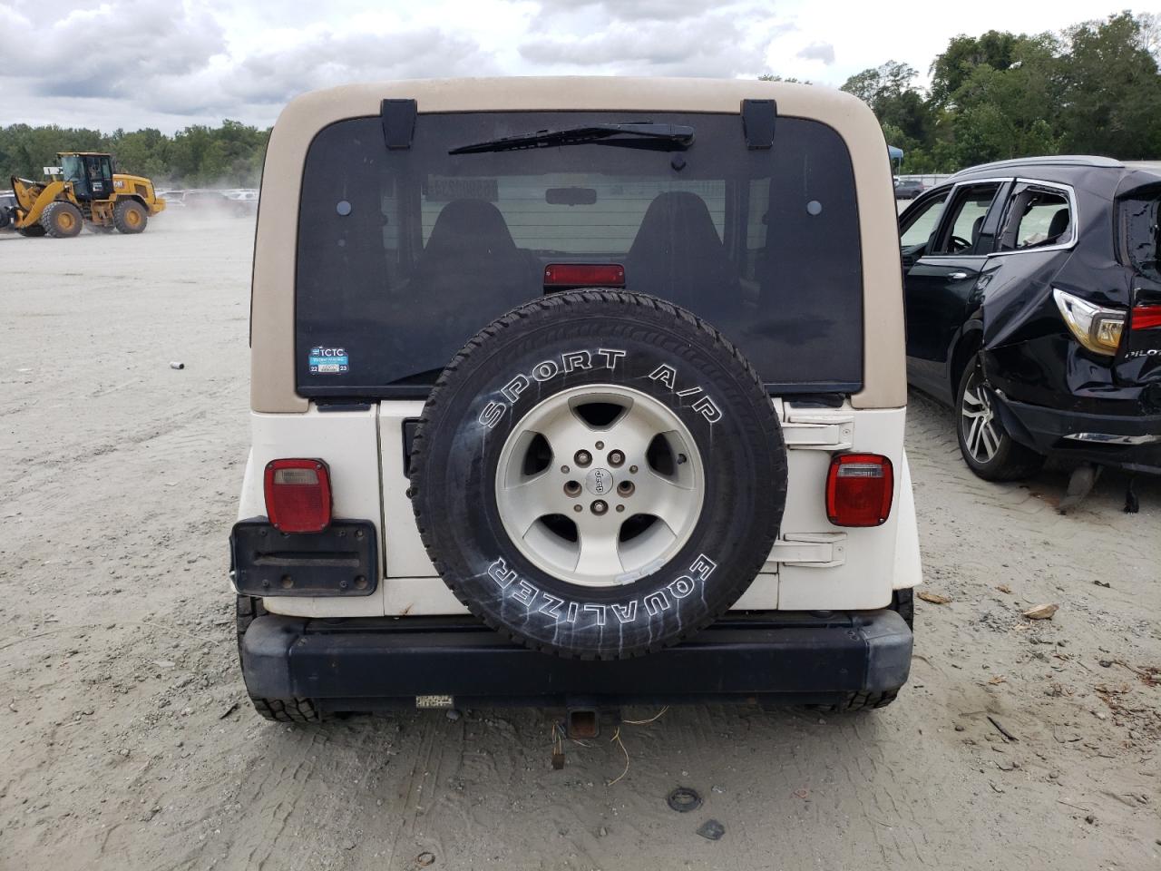 1999 Jeep Wrangler / Tj Sahara VIN: 1J4FY49S1XP489776 Lot: 65900234