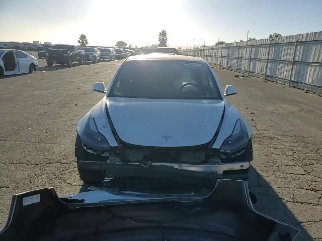 2021 Tesla Model 3 VIN: 5YJ3E1EC9MF875334 Lot: 66940814