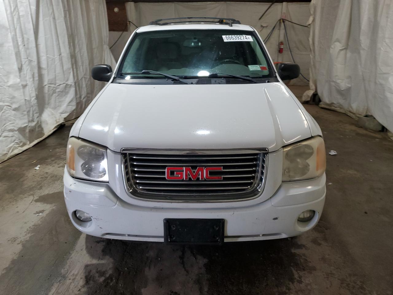 2006 GMC Envoy VIN: 1GKDT13S762133805 Lot: 66639274