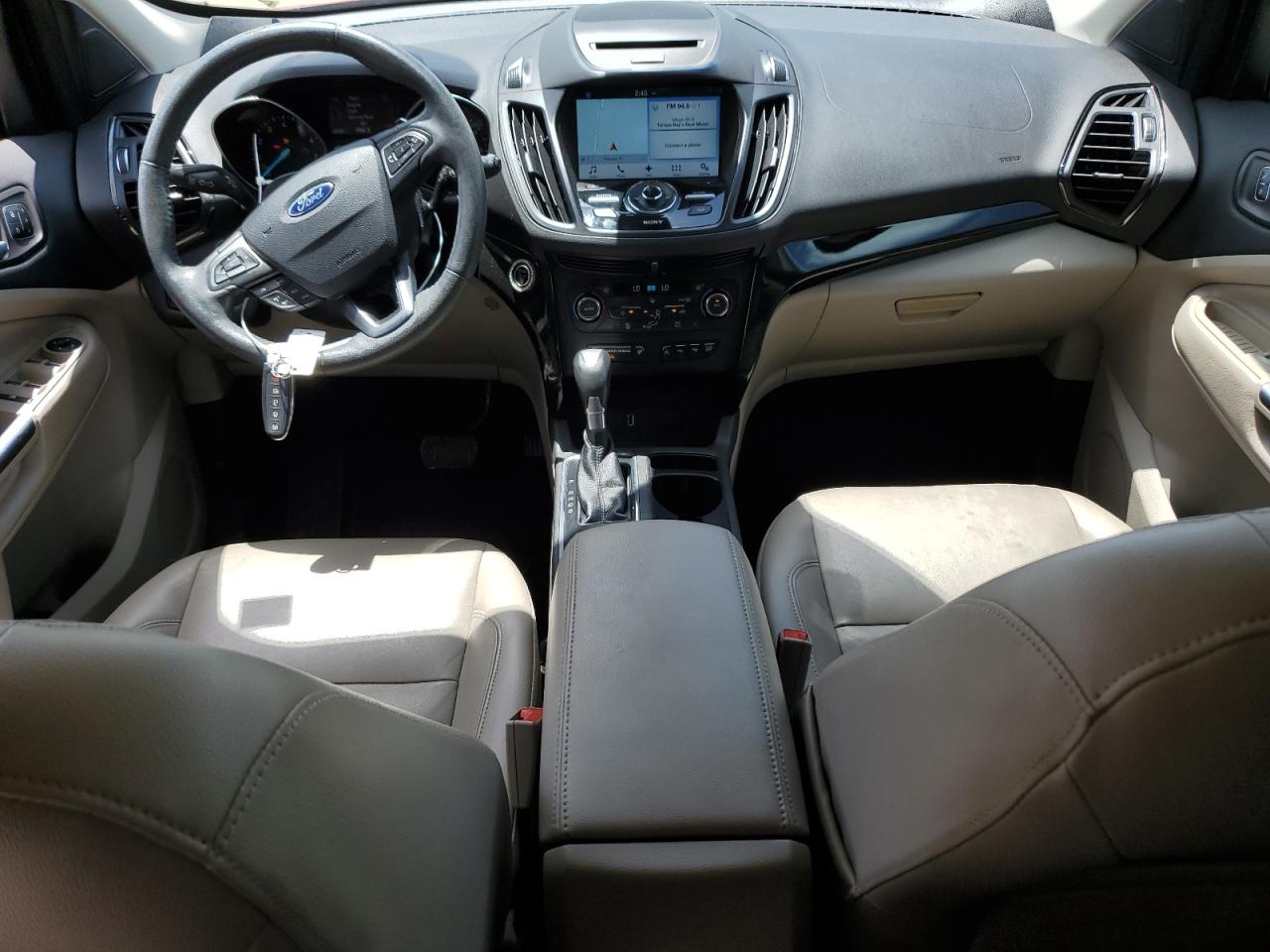 2017 Ford Escape Titanium VIN: 1FMCU0J9XHUC84834 Lot: 65775174