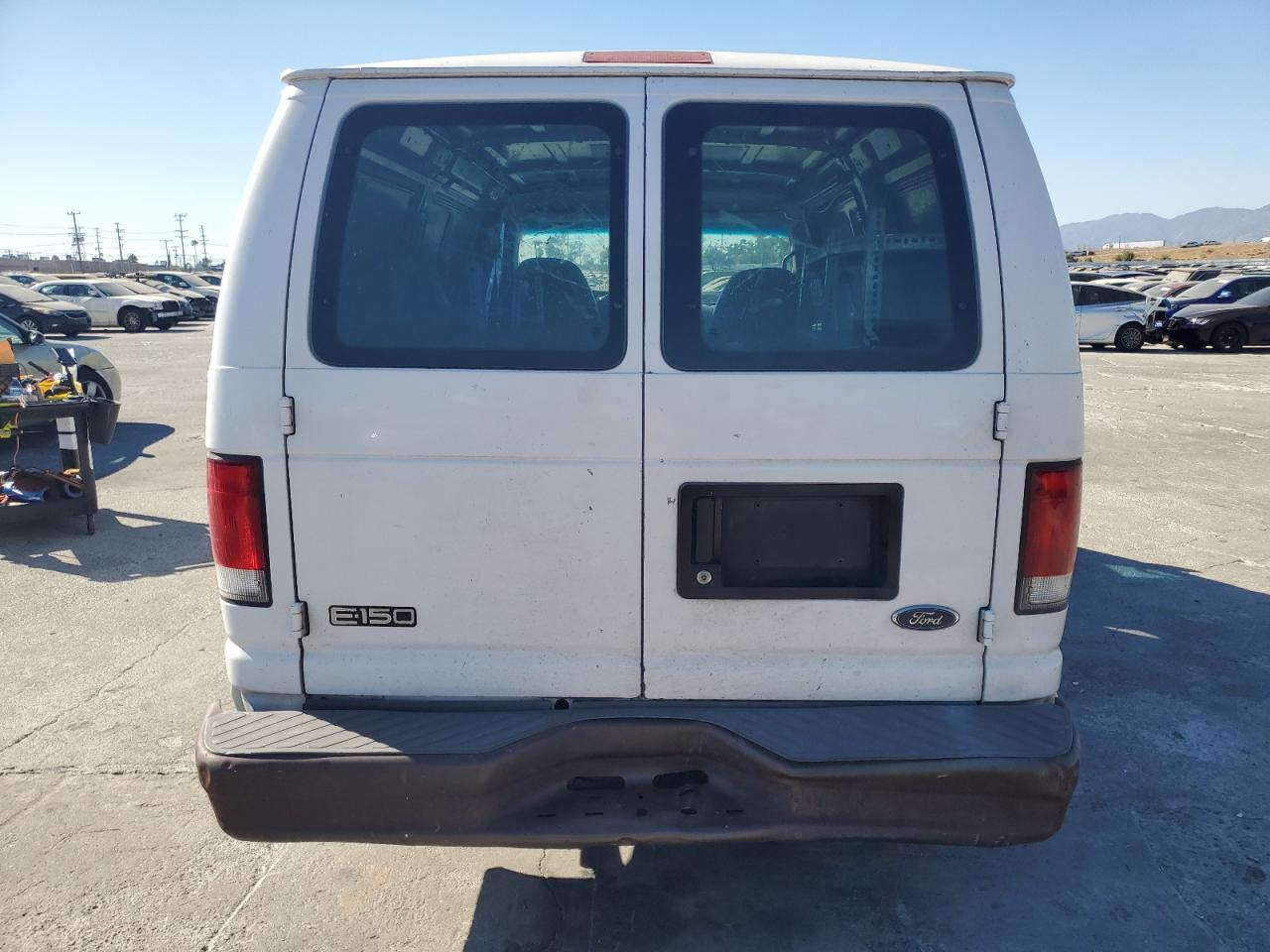 2001 Ford Econoline E150 Van VIN: 1FTRE14201HB48565 Lot: 69500374