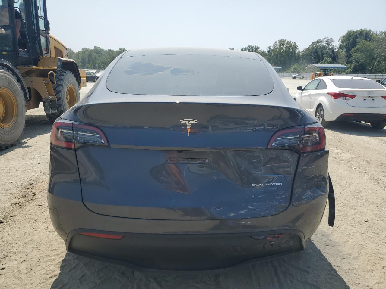 2023 Tesla Model Y VIN: 7SAYGDEEXPF880570 Lot: 68083384