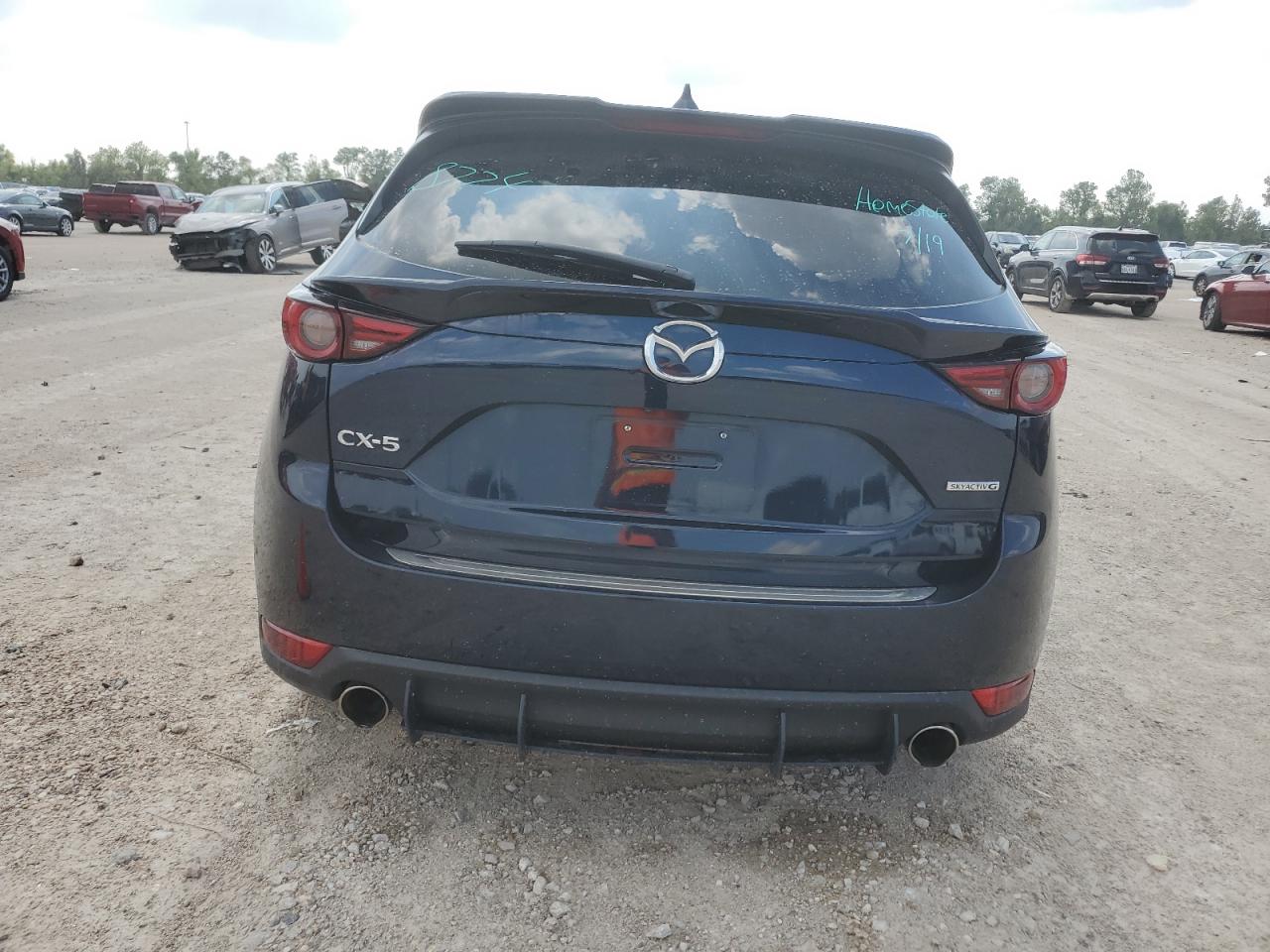 2021 Mazda Cx-5 Grand Touring VIN: JM3KFADM3M0394438 Lot: 63720694