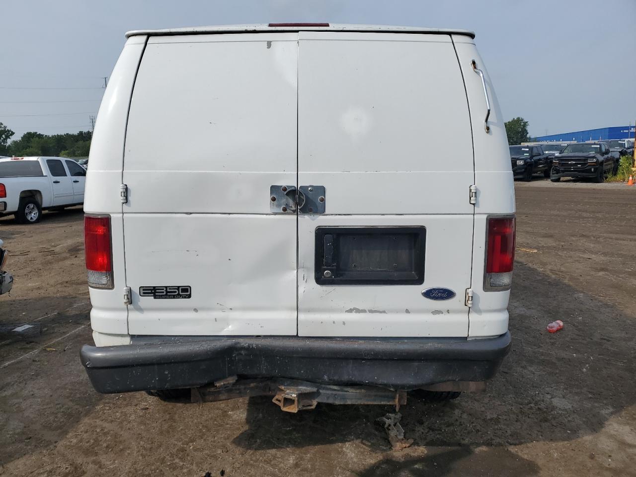 2004 Ford Econoline E350 Super Duty Van VIN: 1FTSE34L34HA14949 Lot: 67405514