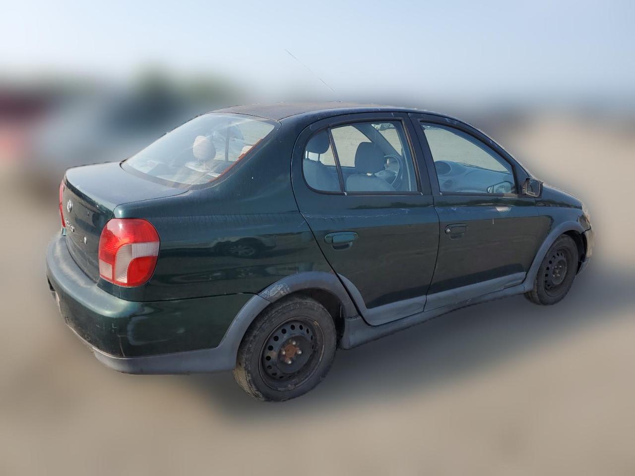 2000 Toyota Echo VIN: JTDBT1236Y0099299 Lot: 65713474