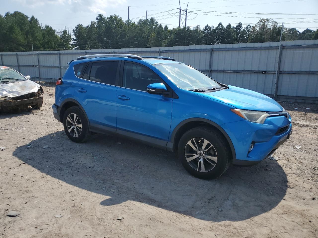 VIN 2T3WFREV0GW310916 2016 TOYOTA RAV4 no.4