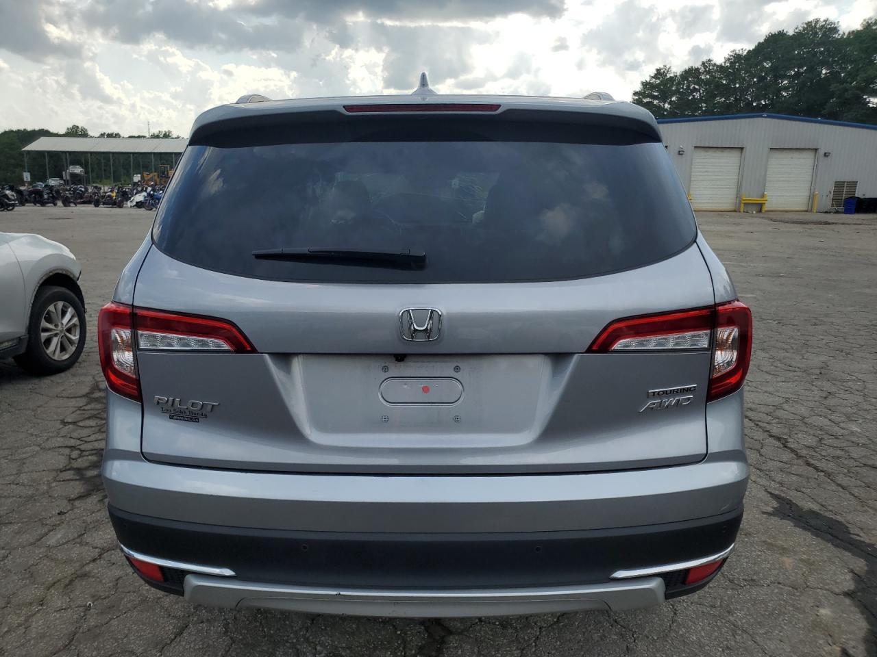 2022 Honda Pilot Touring VIN: 5FNYF6H91NB010147 Lot: 65619094