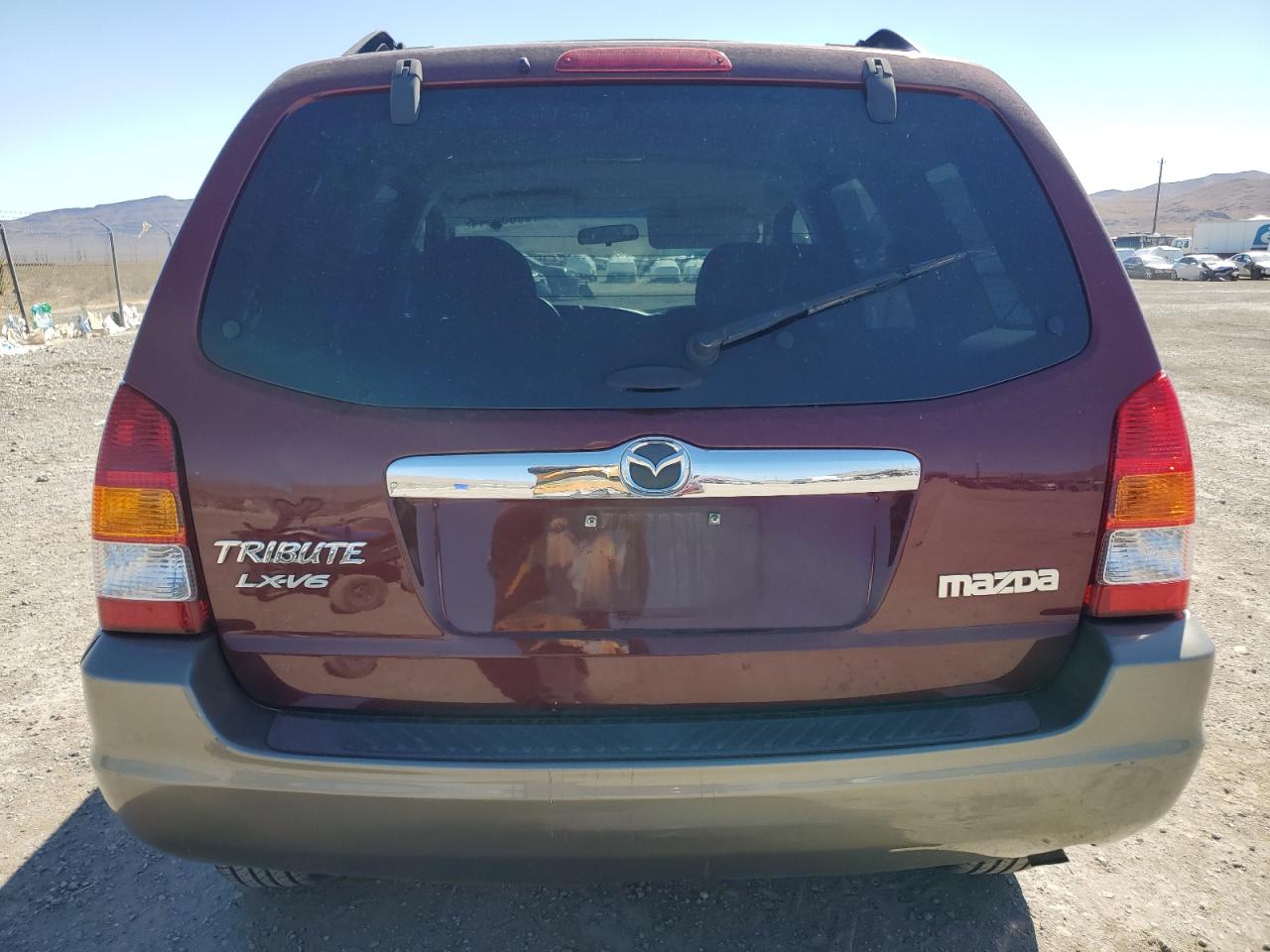 2003 Mazda Tribute Lx VIN: 4F2YZ04163KM16865 Lot: 69633544