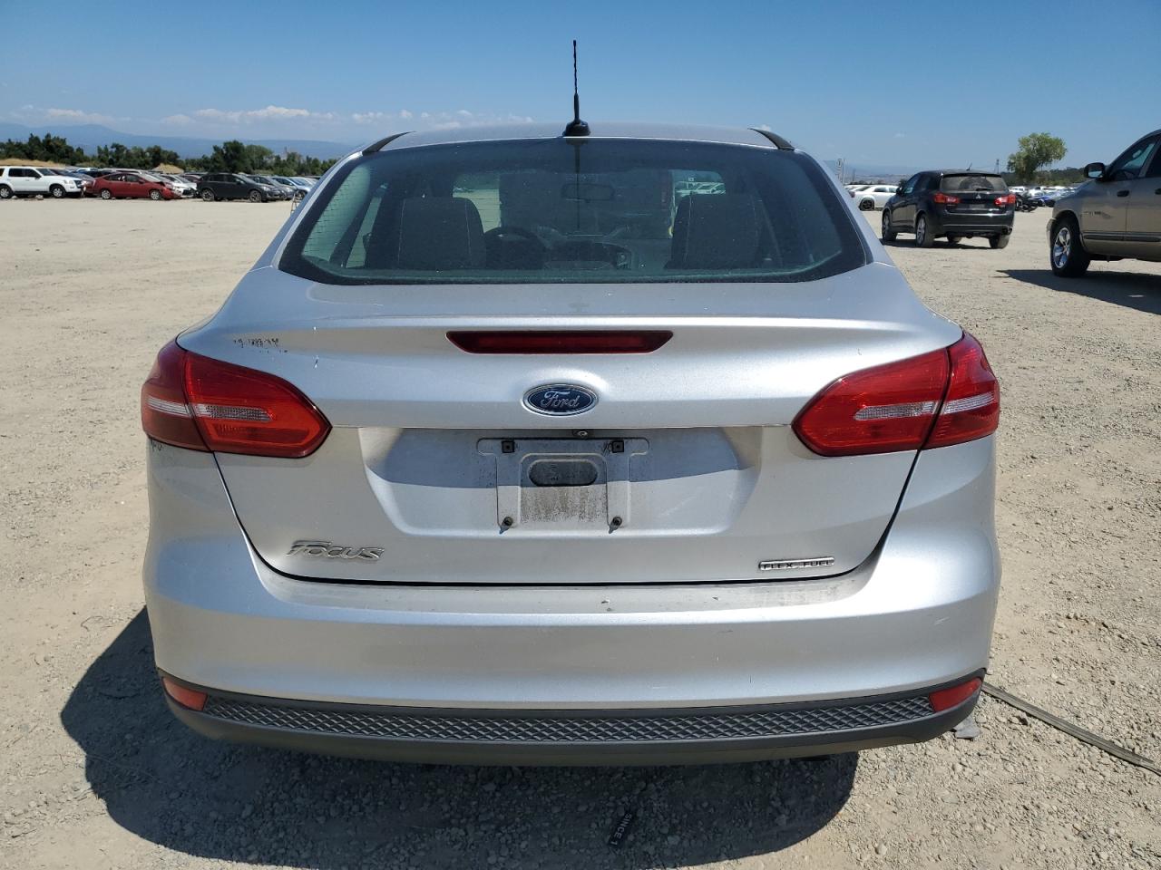 2016 Ford Focus S VIN: 1FADP3E20GL387933 Lot: 67606674