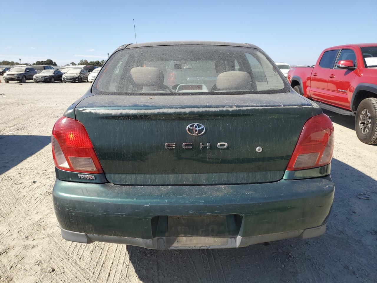 2000 Toyota Echo VIN: JTDBT1238Y0070323 Lot: 66431784