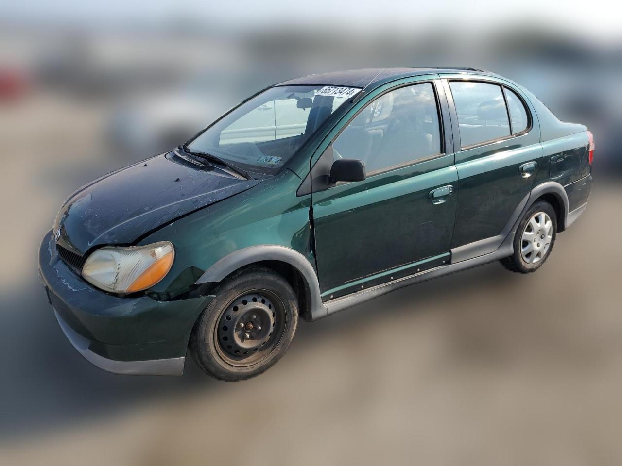 2000 Toyota Echo VIN: JTDBT1236Y0099299 Lot: 65713474