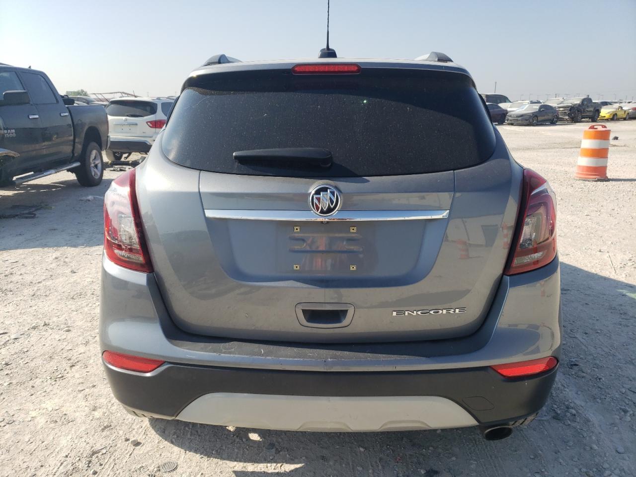 2019 Buick Encore Essence VIN: KL4CJCSM9KB760943 Lot: 68454454