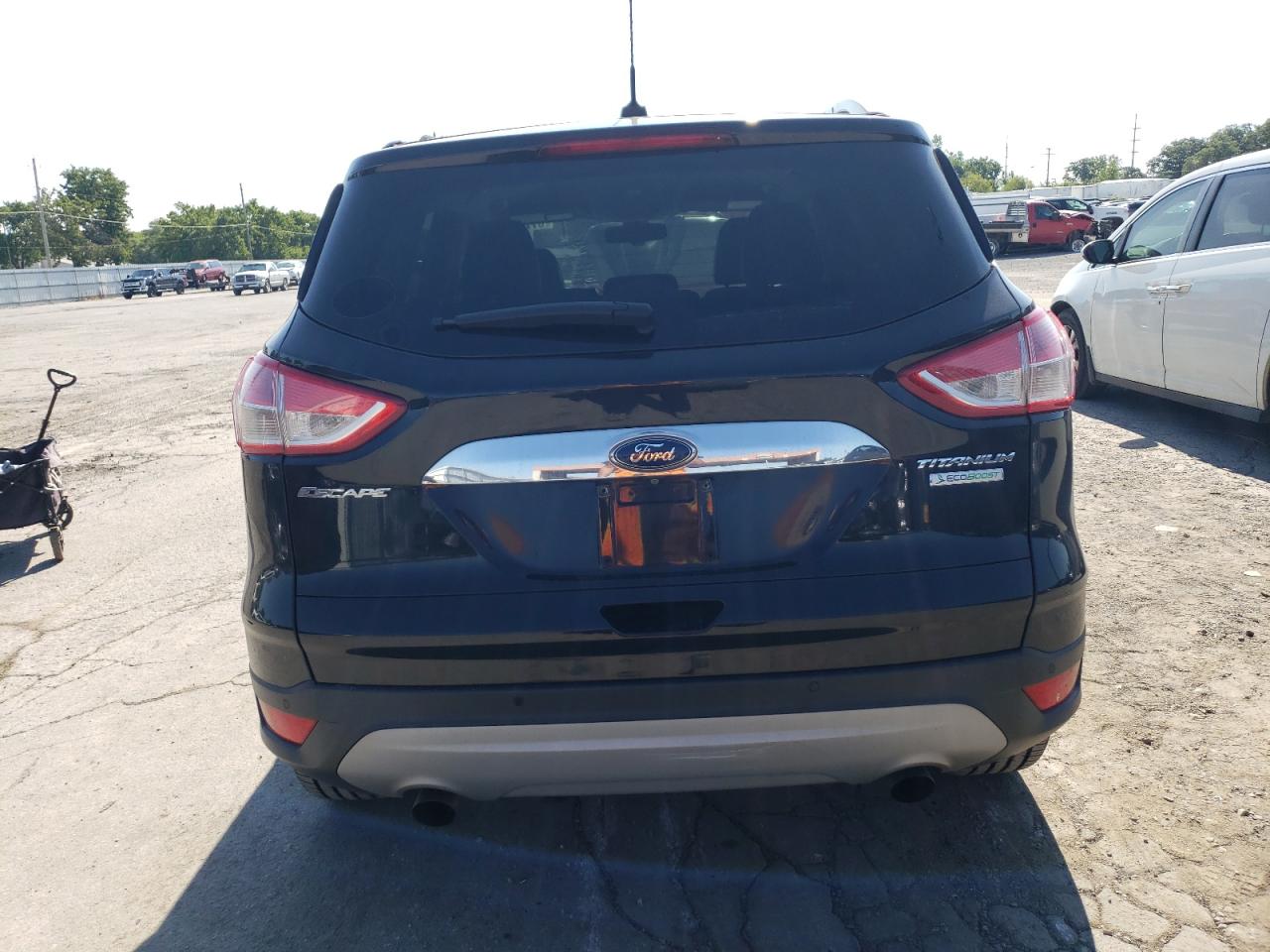 2014 Ford Escape Titanium VIN: 1FMCU0JX0EUB60520 Lot: 67244644