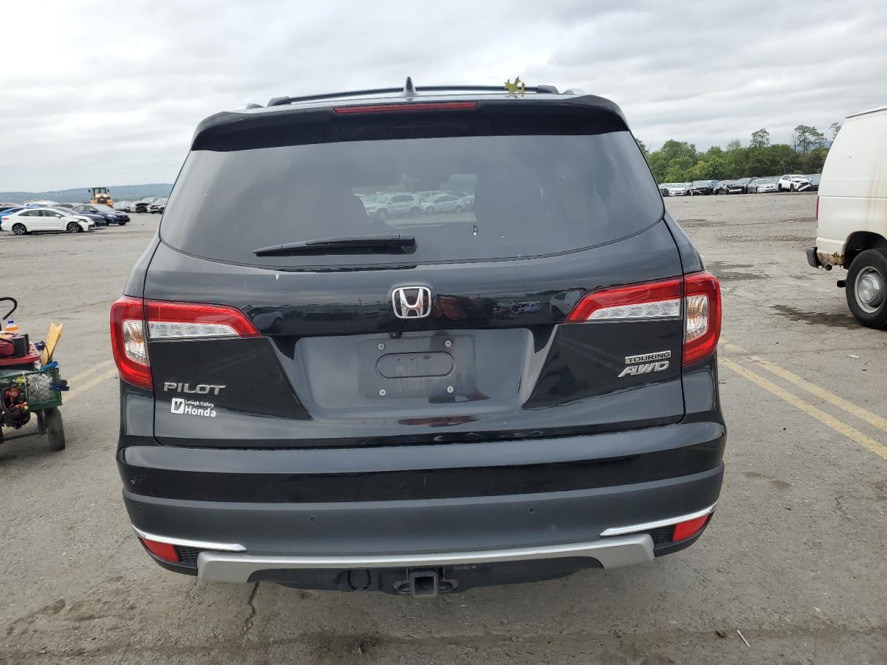 2021 Honda Pilot Touring VIN: 5FNYF6H94MB068008 Lot: 69725444