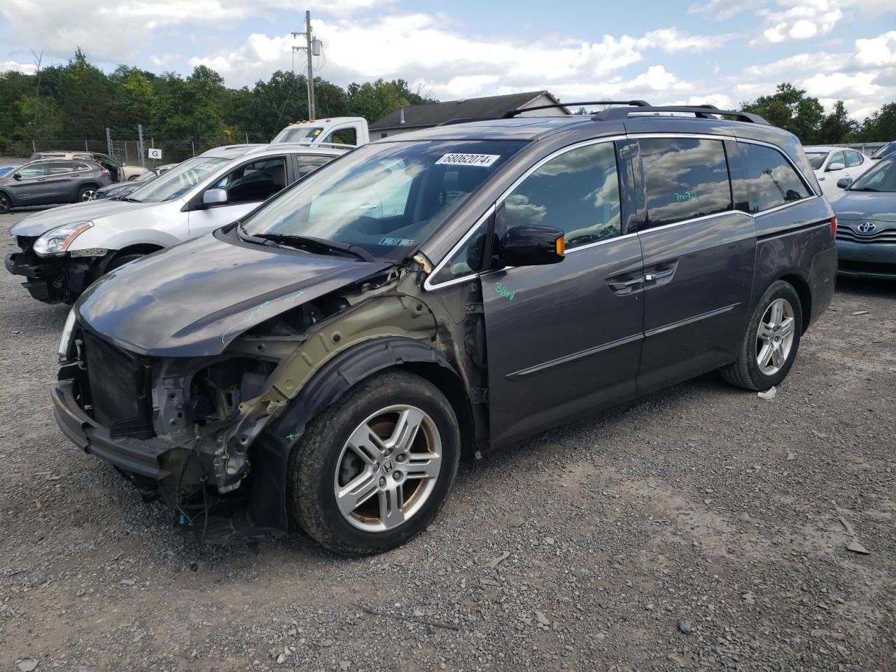 2011 Honda Odyssey Touring VIN: 5FNRL5H99BB057770 Lot: 68062074