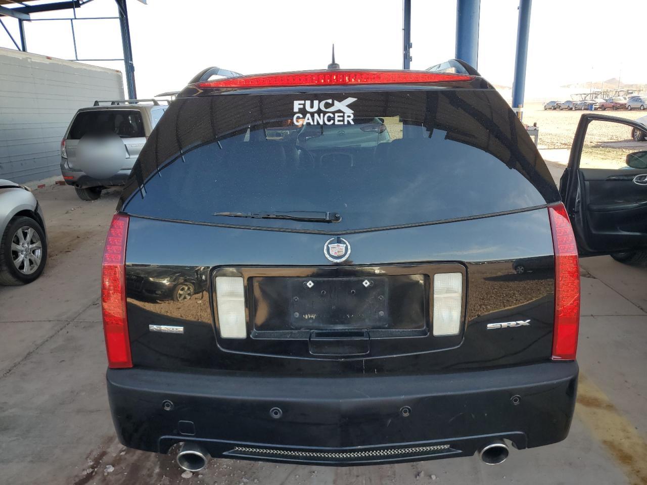 2009 Cadillac Srx VIN: 1GYEE23A590103588 Lot: 67389064