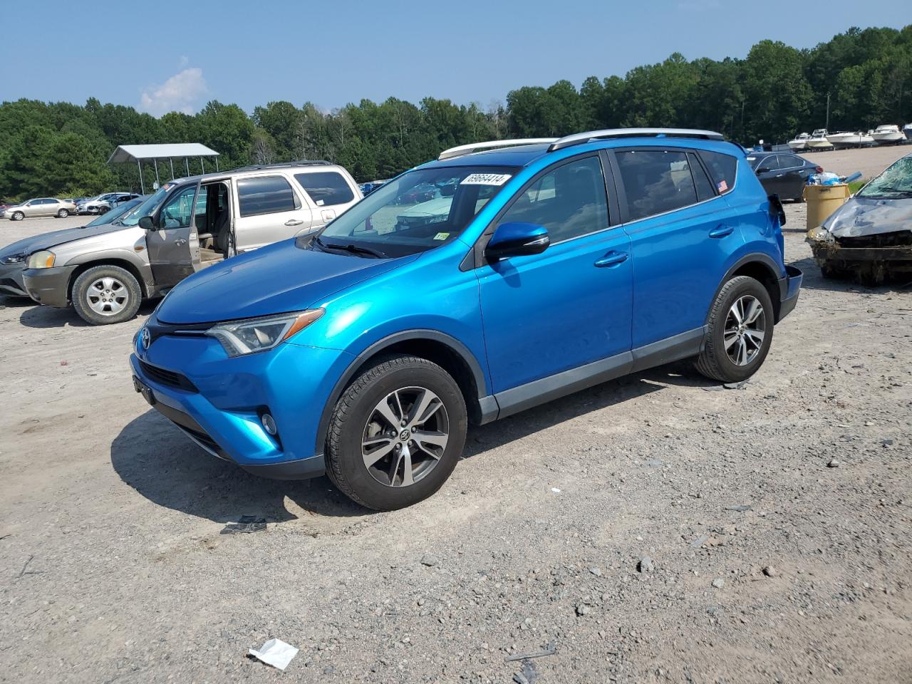 VIN 2T3WFREV0GW310916 2016 TOYOTA RAV4 no.1