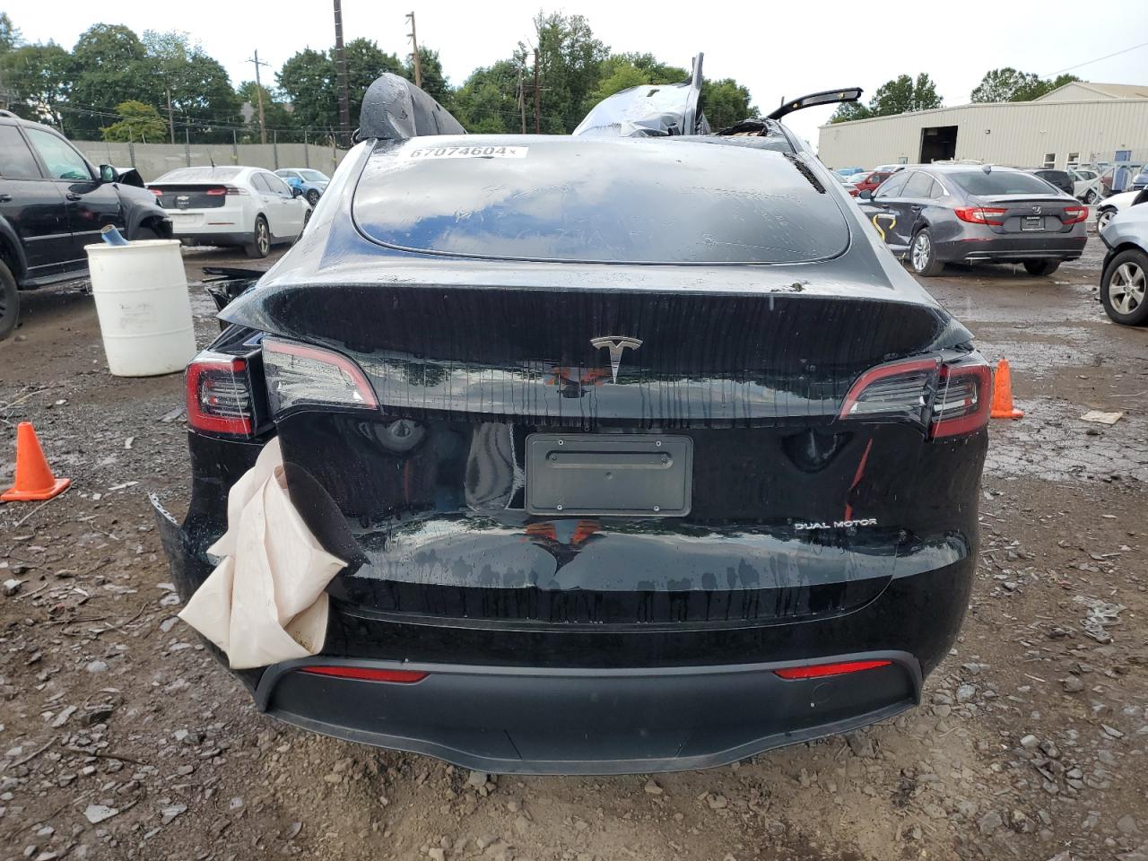 2023 Tesla Model Y VIN: 7SAYGDEE0PA090045 Lot: 67074604