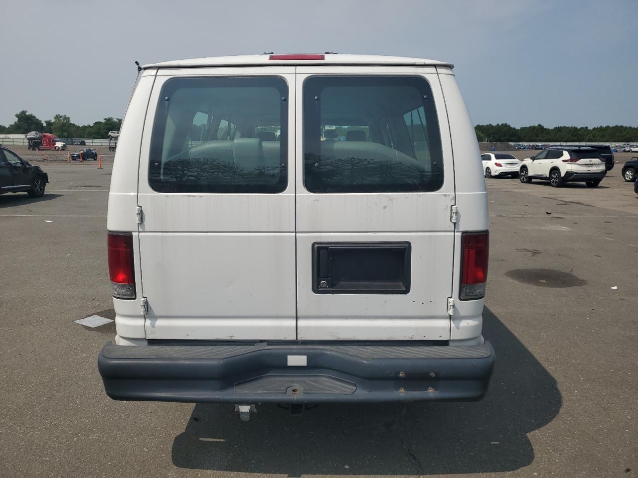 2010 Ford Econoline E350 Super Duty Wagon VIN: 1FBSS3BL5ADA53819 Lot: 67639204