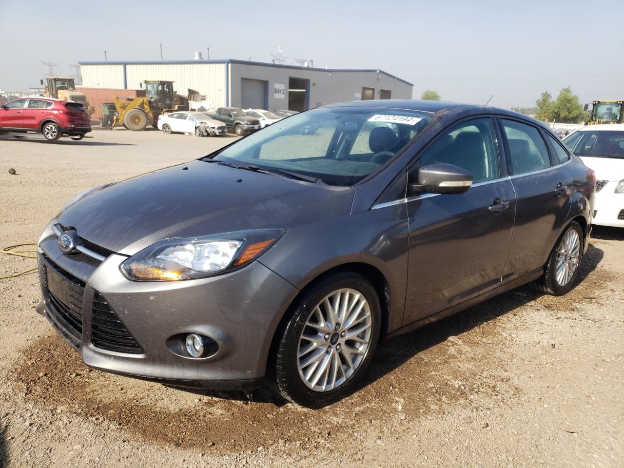 2014 Ford Focus Titanium VIN: 1FADP3J25EL449040 Lot: 67124194