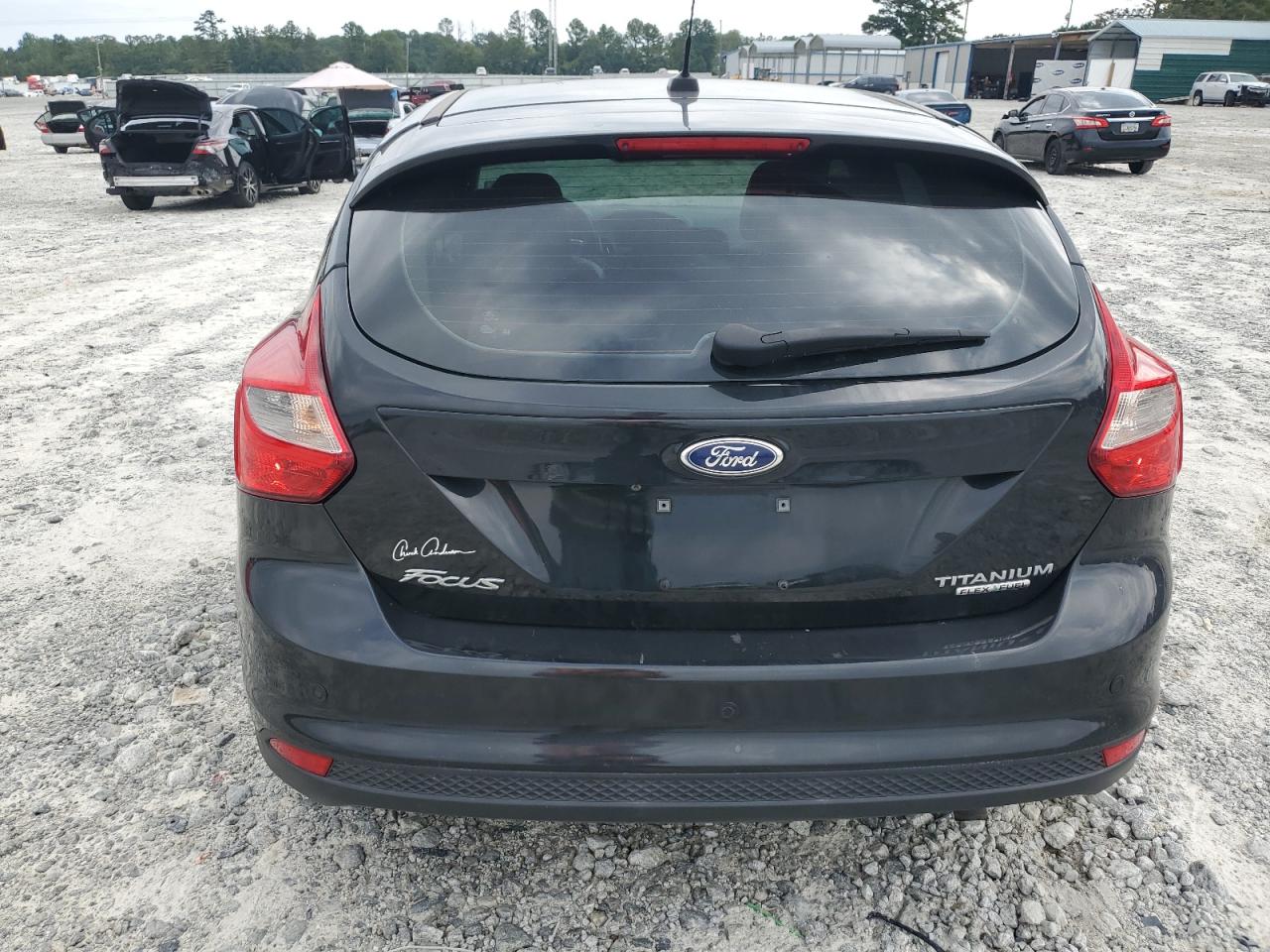 2014 Ford Focus Titanium VIN: 1FADP3N25EL349370 Lot: 68540244