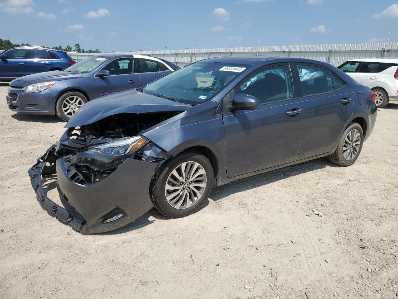 5YFBURHE3JP747682 2018 TOYOTA COROLLA - Image 1