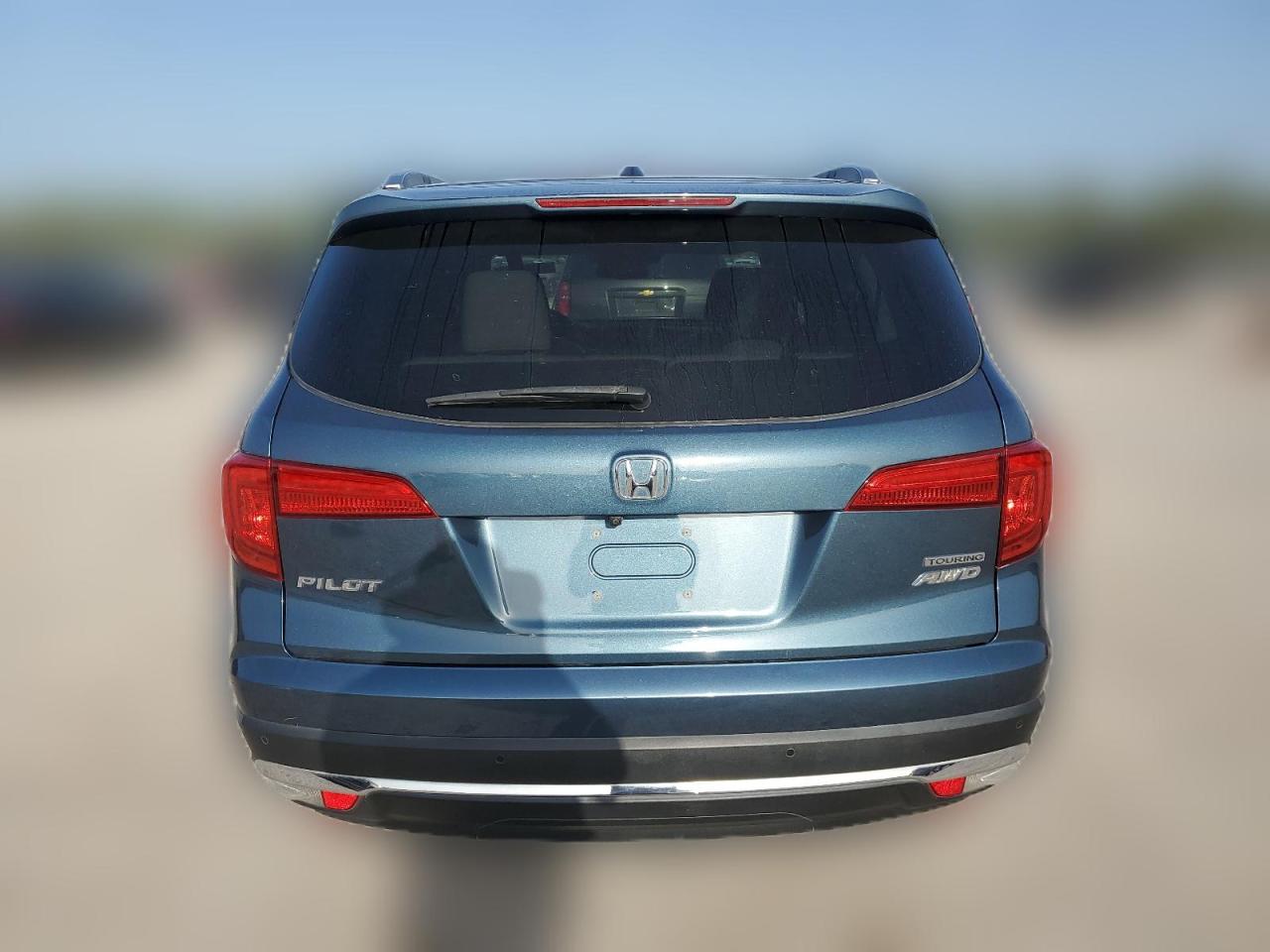 2018 Honda Pilot Touring VIN: 5FNYF6H95JB023087 Lot: 65847994