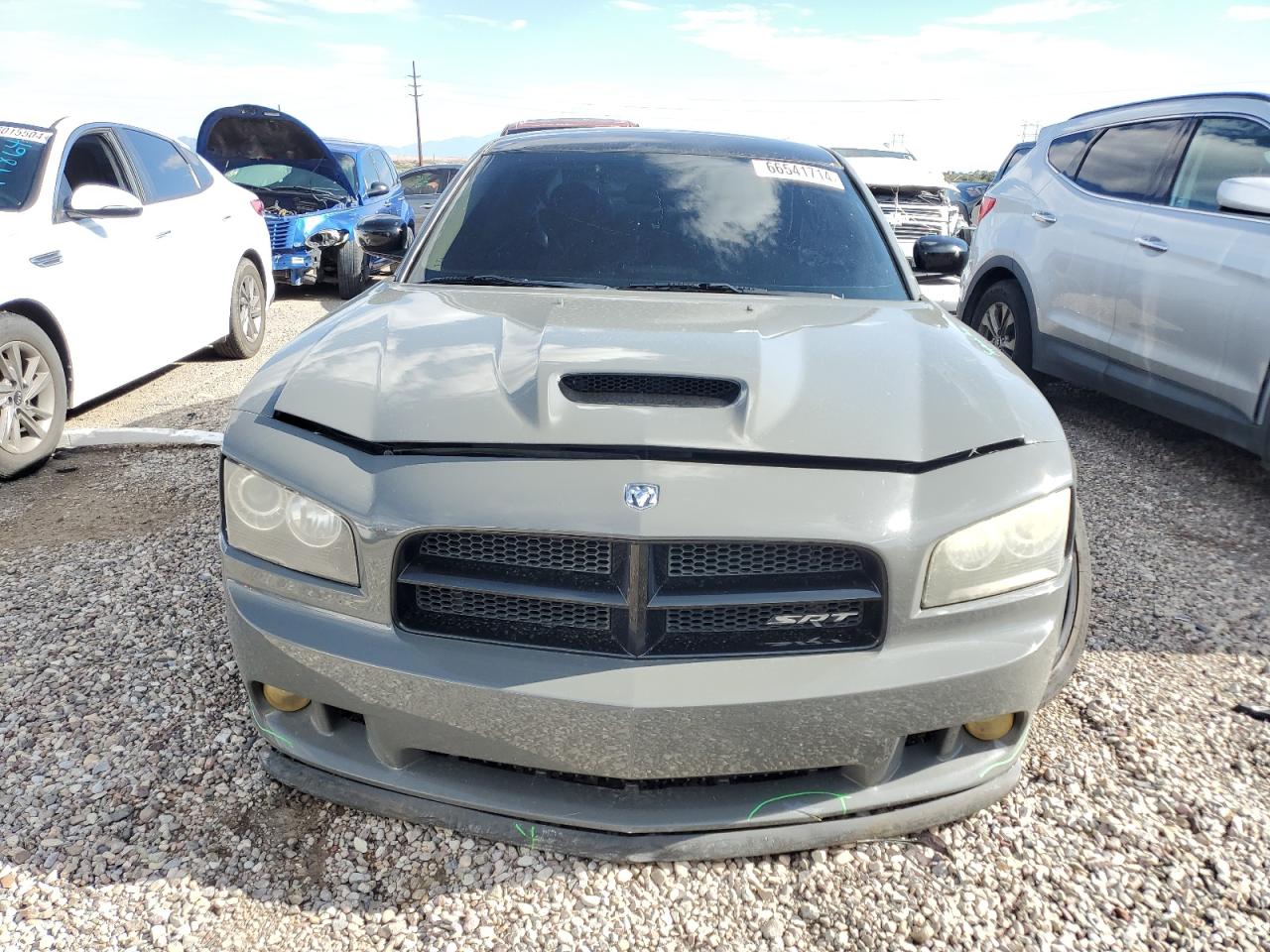 2009 Dodge Charger Srt-8 VIN: 2B3LA73WX9H557401 Lot: 66541714