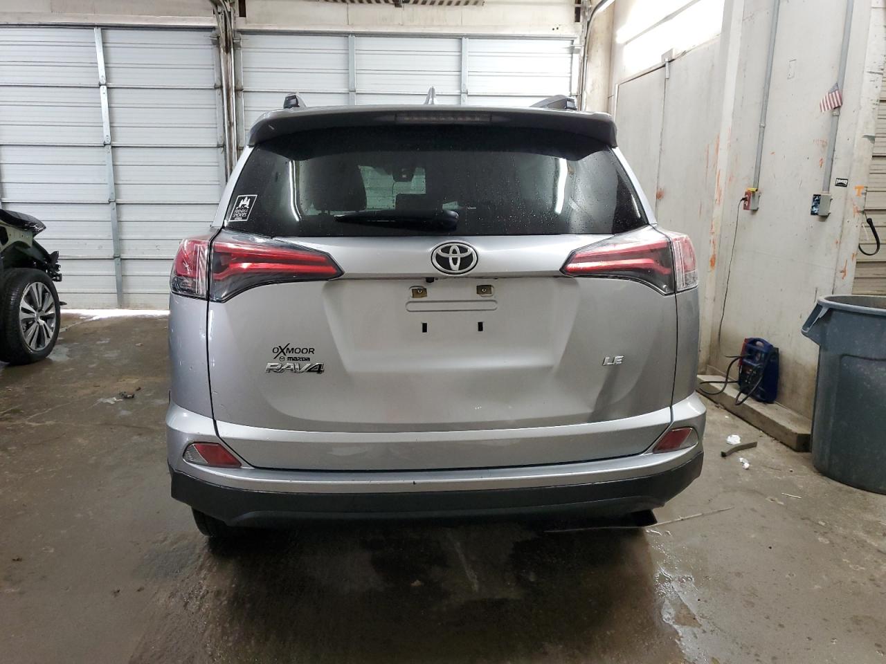 2018 Toyota Rav4 Le VIN: JTMZFREV8JJ184209 Lot: 67842874