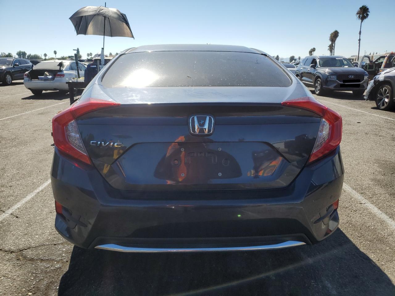 2020 Honda Civic Lx VIN: 19XFC2F69LE203831 Lot: 69117564