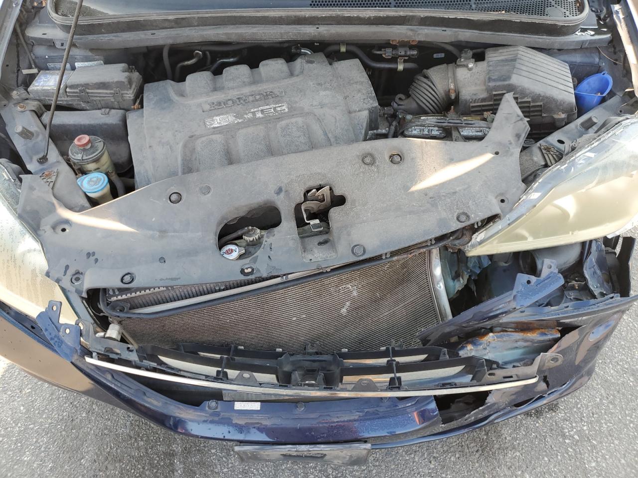 2007 Honda Odyssey Lx VIN: 5FNRL38247B124631 Lot: 63987734