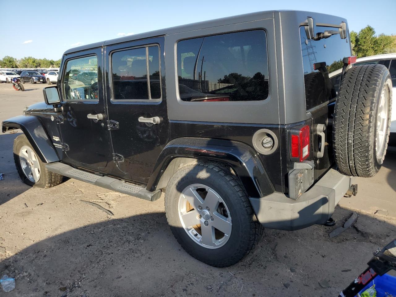 2011 Jeep Wrangler Unlimited Sahara VIN: 1J4HA5H12BL513627 Lot: 68748464