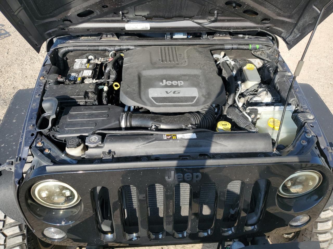 1C4BJWDG3GL213906 2016 Jeep Wrangler Unlimited Sport