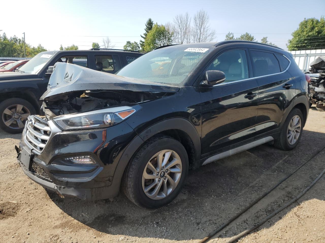 KM8J3CA48HU492372 2017 HYUNDAI TUCSON - Image 1