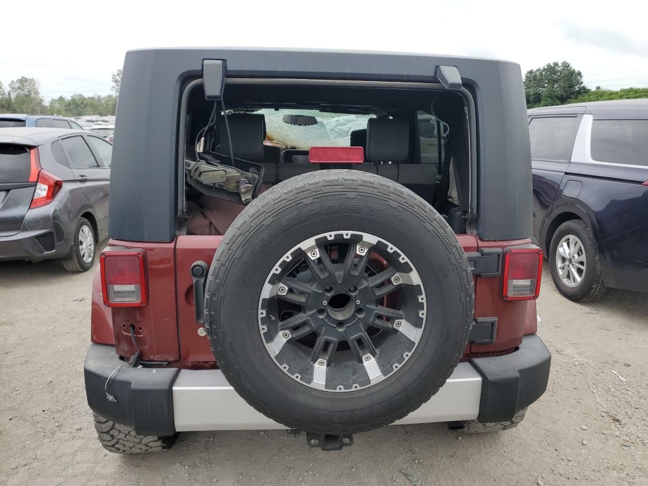 2008 Jeep Wrangler Unlimited Sahara VIN: 1J8GA59128L594680 Lot: 66046944