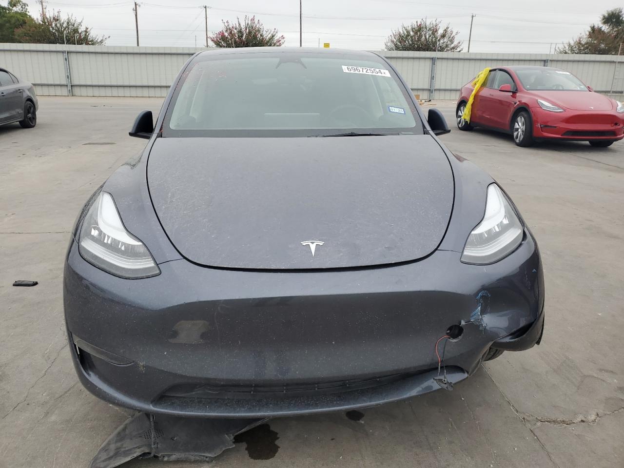 2023 Tesla Model Y VIN: 7SAYGAEE4PF614962 Lot: 69672554