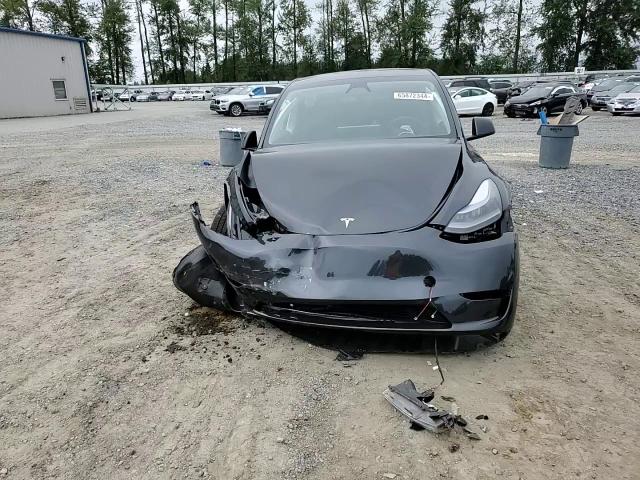 2024 Tesla Model Y VIN: 7SAYGDEE6RF052325 Lot: 65872344