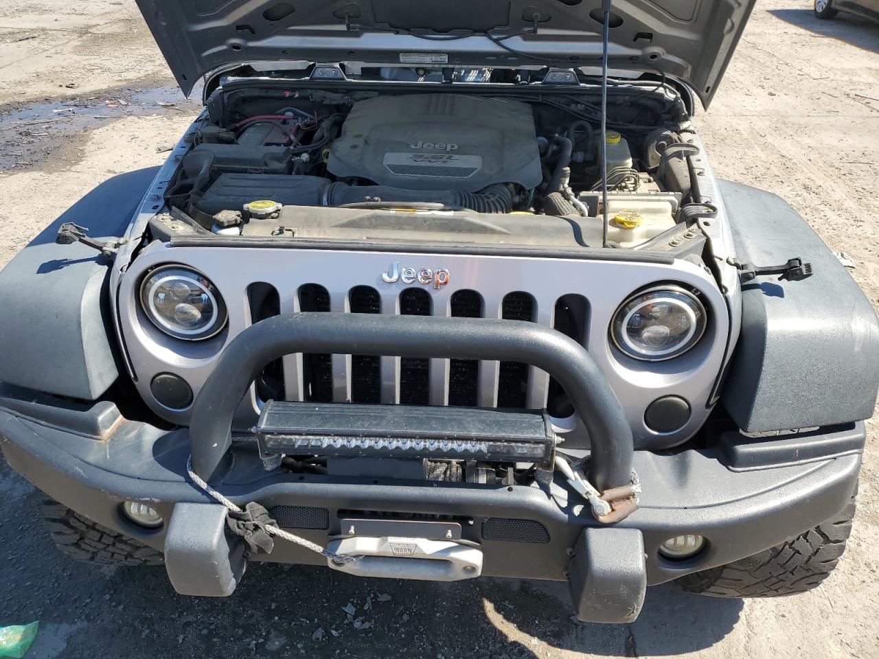 1C4BJWDGXDL658977 2013 Jeep Wrangler Unlimited Sport