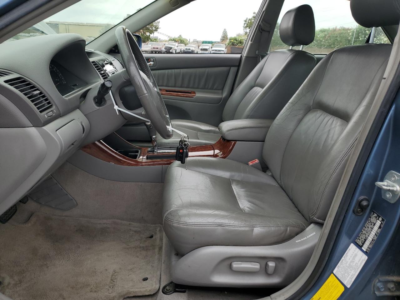 2003 Toyota Camry Le VIN: JTDBF30K830151702 Lot: 66147124