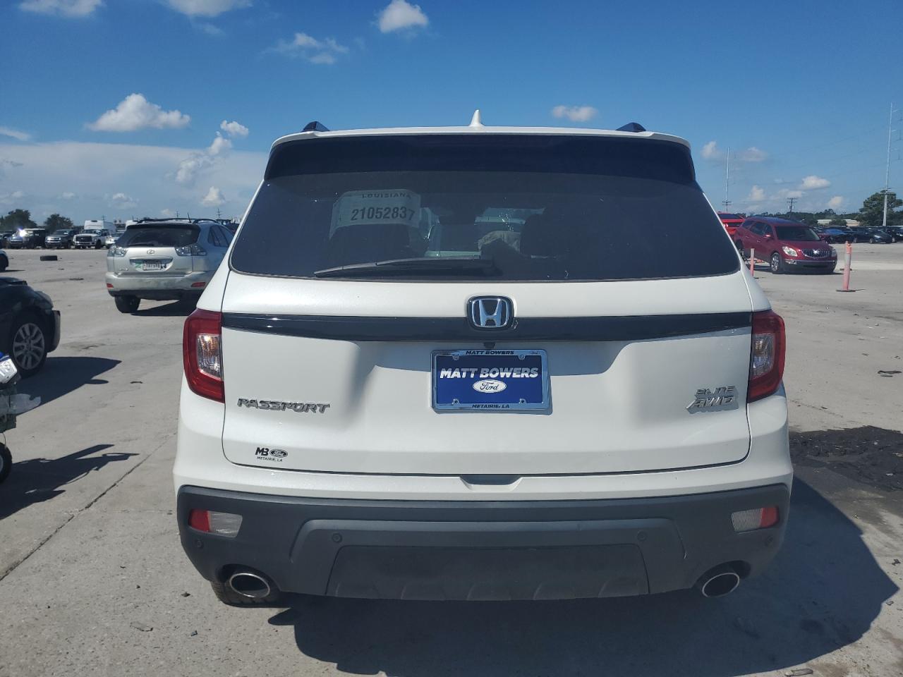 2021 Honda Passport Elite VIN: 5FNYF8H04MB025964 Lot: 65812214