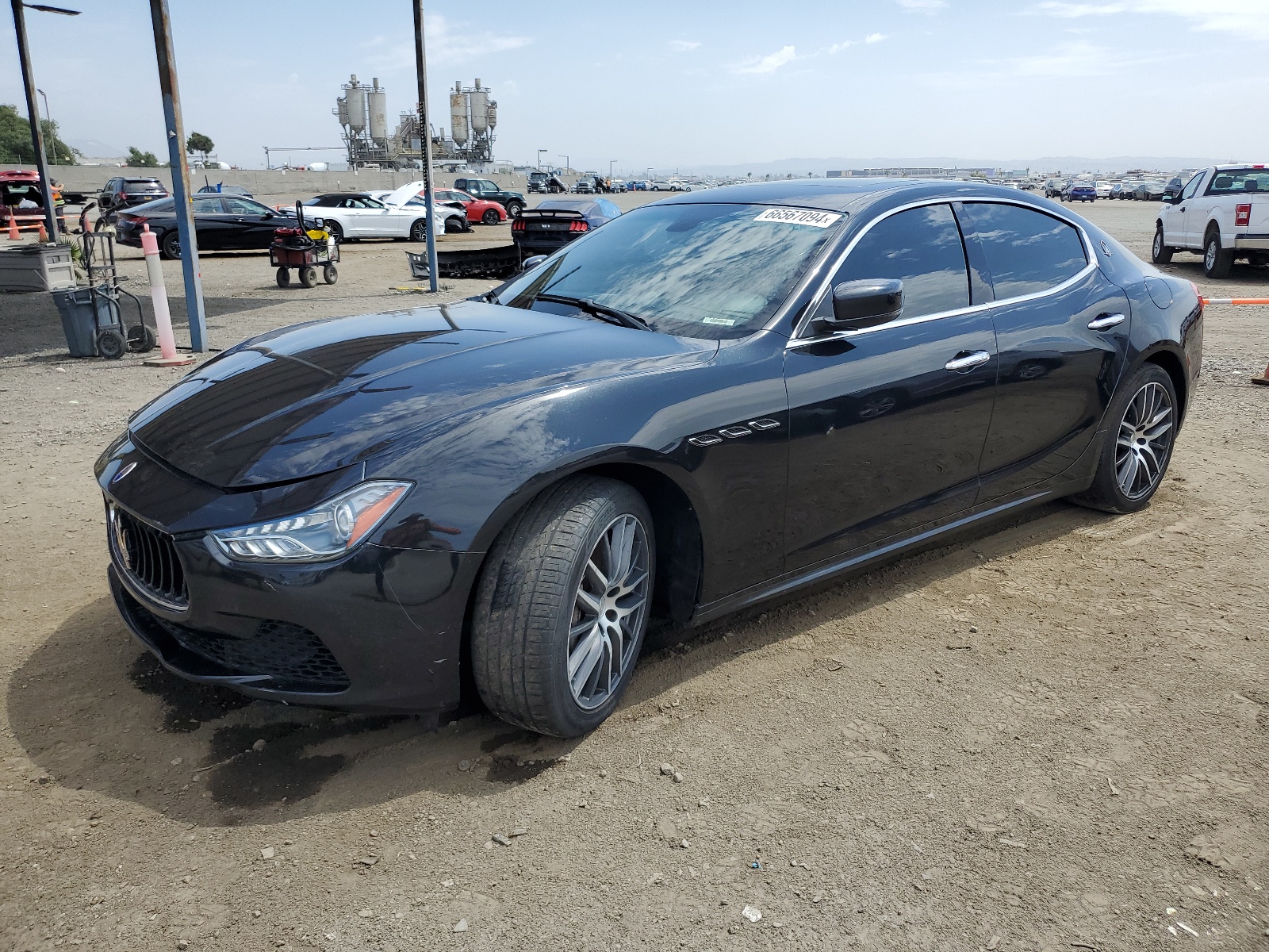 2014 Maserati Ghibli vin: ZAM57XSA5E1090243