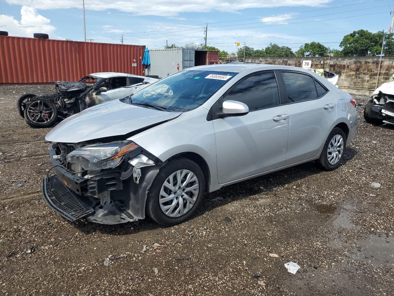 VIN 5YFBURHE2KP869077 2019 TOYOTA COROLLA no.1